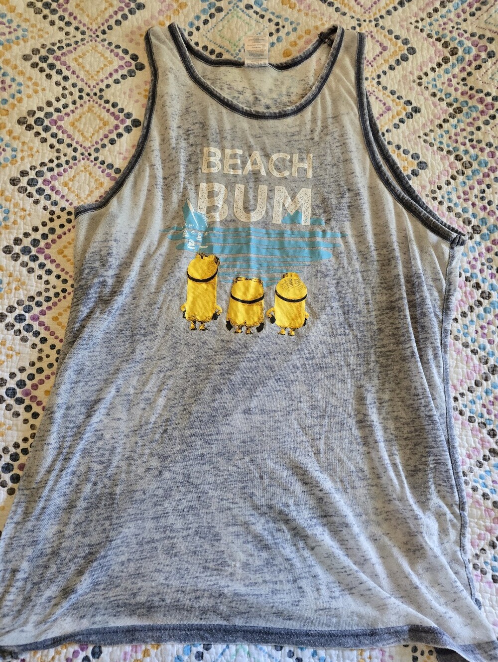 Beach Bum Tank graphic and three Minions from the Despicable